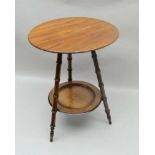 A 19TH CENTURY AESTHETIC PERIOD CIRCULAR TOPPED OCCASIONAL TABLE, on three outswept bamboo turned