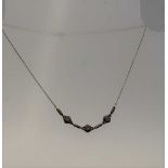 AN 18CT WHITE GOLD PENDANT ON CHAIN, the pendant inset diamond, gross weight; 3.2g, together with