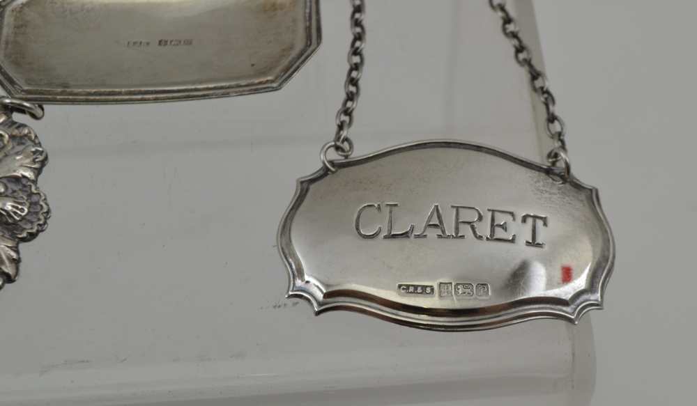 A COLLECTION OF SEVEN ASSORTED SILVER WINE & SPIRIT LABELS, various stamped shapes, with chains, - Image 3 of 4