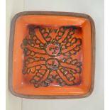 MARGERY CLINTON (Ex Glasgow School of Art) A STUDIO POTTERY SQUARE DISH volcanic orange glazed,