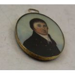 A GEORGE III OVAL MINIATURE PORTRAIT OF A GENTLEMAN, wearing a white cravat, circa 1800, with