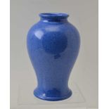 A MOORCROFT VASE, of baluster form, powder blue glaze, impressed factory marks to base, 15cm high