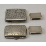 TWO ENGRAVED SILVER CIGARETTE CASES Birmingham 1916 & Birmingham 1929, with gilded interiors,