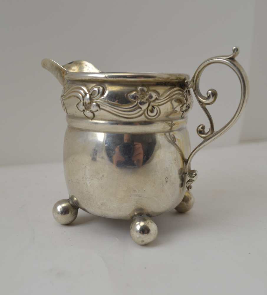 AN ART NOUVEAU SILVER CREAM JUG Birmingham 1903 together with a silver Christening mug, Birmingham - Image 3 of 5