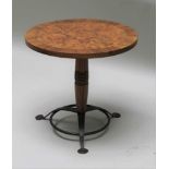 MICHAEL REED DESIGN OF LONDON (for FELIX DENNIS) A MIXED WOODEN VENEERED CIRCULAR TOPPED COFFEE