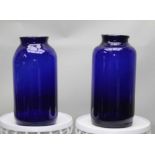 A PAIR OF 'BRISTOL BLUE' LARGE GLASS DISPLAY VASES, 58cm high