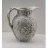 A VICTORIAN BISQUE ALE JUG, moulded with hop gathering decoration in the round, twisted vine handle,