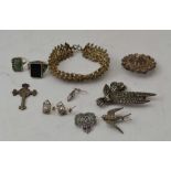 A SELECTION OF SILVER AND MARCASITE COSTUME JEWELLERY, to include; rings, brooches, earrings,
