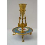 A 19TH CENTURY FRENCH CANDLESTICK, gilt brass frame with hand painted porcelain dish base,