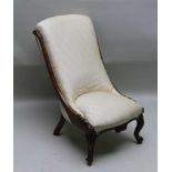 A 19TH CENTURY ROSEWOOD FRAMED HIGH BACKED SLIPPER CHAIR, with ivory silk effect upholstered back