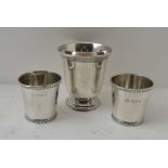 JAY RICHARD ATTENBOROUGH CO. LTD A PAIR OF FLARED SILVER TOTS, Chester 1916, combined weight; 65g,