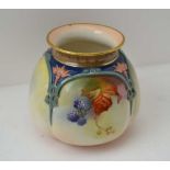 A ROYAL WORCESTER JAMES HADLEY CHINA VASE of squat lobed form, moulded Gothic Revival strap work,