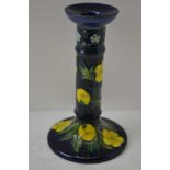 A MOORCROFT POTTERY CANDLESTICK, tube lined and painted buttercup decoration, impressed and