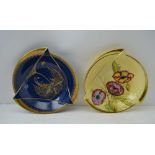 TWO ART DECO CARLTONWARE BOWLS, one powder blue ground with gilded exotic bird decoration, 26cm in