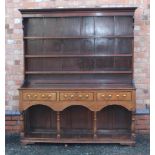 A 19TH CENTURY OAK DRESSER, with triple shelved plate rack back, the base unit having three inline