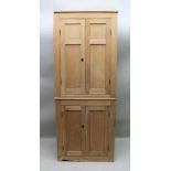 A 20TH CENTURY PINE HALL / PANTRY CUPBOARD having two sets of doors, the upper having three