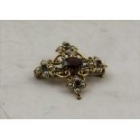 A 9CT GOLD, GARNET AND MOTHER OF PEARL SET BROOCH, of cruciform, 3.5cm