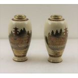 A PAIR OF JAPANESE SATSUMA VASES, ivory ground, polychrome enamel and gilded decoration, to