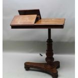 A 19TH CENTURY MAHOGANY ADJUSTABLE READING STAND, the rectangular top having, two sectional opposing