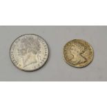TWO EARLY BRITISH COINS, a 1713 Queen Anne silver shilling and an 1823 George IV silver half-