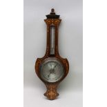 A 19TH CENTURY WALL MOUNTING BANJO BAROMETER THERMOMETER in decorative inlaid wooden backing, with