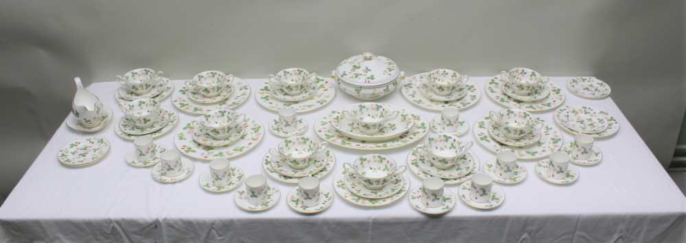 A WEDGWOOD 'WILD STRAWBERRY' TEA / DINNER SERVICE, comprising; lidded tureen, one oval serving bowl,