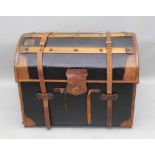 A LATE 19TH CENTURY PART WOODEN STAIVED DOME TOP TRAVELLING TRUNK with remains of original leather