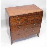 A REGENCY MAHOGANY CADDY TOP CHEST OF THREE DRAWERS, having crossbanded top, circular ring knop