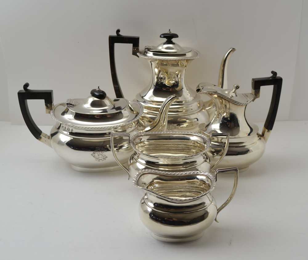 WILLIAM WILLIAMS LTD A LATE VICTORIAN FIVE PIECE SILVER TEA & COFFEE SET of Georgian design,