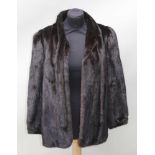 A DARK BROWN MINK JACKET, label inside 'Konrad Furs, 42 Sloane Street, London SW1'