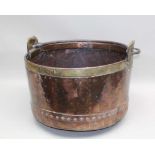 A 19TH CENTURY RIVETED SWING HANDLED COPPER CAULDRON / LOG BIN, 37cm high x 54xm in diameter