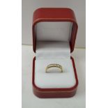 AN 18CT GOLD LADIES RING inset five brilliant cut diamonds, gross weight 2.6g