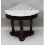 A VICTORIAN DEMI-LUNE MARBLE TOPPED WASHSTAND, with humped splash back, plain deep frieze, supported