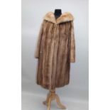 A GOOD QUALITY BLOND MINK LADY'S THREE-QUARTER LENGTH FUR COAT, with wide collar