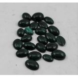 A BAG OF MALACHITE POLISHED JEWELLERS CABOCHON STONES, 1.5cm x 1cm (20)