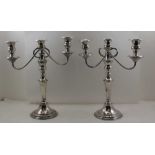 A PAIR OF SILVER ON COPPER CANDELABRA of Georgian design, each stick with a removable twin branch,