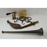 AN EARLY 20TH CENTURY BRASS & IRON CARTRIDGE LOADER with ebonised handle, a leather shot flask,