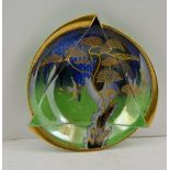 A CARLTONWARE ART DECO HERON & MAGICAL TREE PATTERN LUSTRE BOWL, circular relief moulded, printed