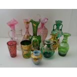 A COLLECTION OF DECORATIVE GLASSWARE, various colours, cranberry, green, pink, with gilded and