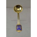A DANISH SILVER GILT SPOON, with blue ground enamel crest to handle terminal, 41g