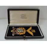 A 9CT GOLD MASONIC JEWEL, enamelled decoration, for the WM of Mercium Lodge, No. 4715, each