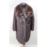 A DARK BROWN MINK THREE -QUARTER LENGTH COAT