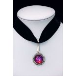 AN ART NOUVEAU DESIGN PENDANT, set with an oval Czech crystal dragon's breath cabochon, 1.5cm in