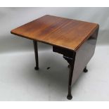 A GEORGIAN MAHOGANY RECTANGULAR TWIN FLAP DINING TABLE, having single gateleg action, supported on