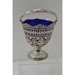 WILLIAM PLUMMER An 18th century silver basket with blue glass liner, pierced decoration, with