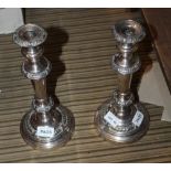 A PAIR OF 19TH CENTURY SILVER PLATE TABLE CANDLESTICKS