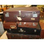 A VARIED SELECTION OF SUITCASES AND TRAVELLING TRUNKS