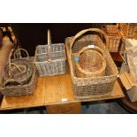 A SMALL SELECTION OF WOVEN WICKER FIXED HANDLED BASKETS