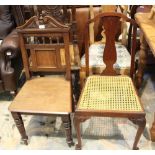 A LATE VICTORIAN SCROLL CREST HALL CHAIR with panelled seat together with a cane seated single