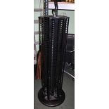 A BLACK FINISHED METAL REVOLVING FREESTANDING CD STORAGE TOWER